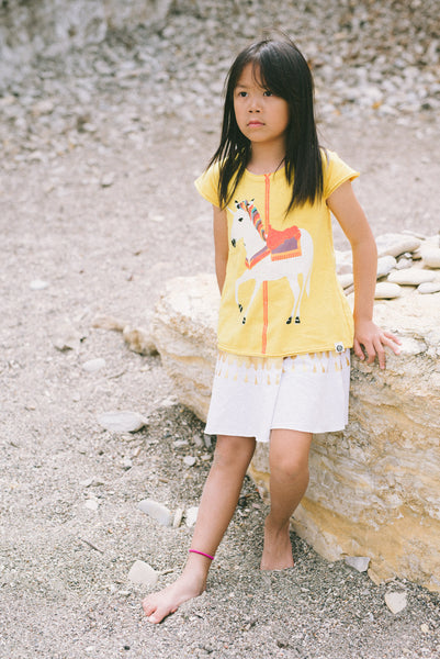 White Unicorn Carousel Baby Dress by: Mini Shatsu